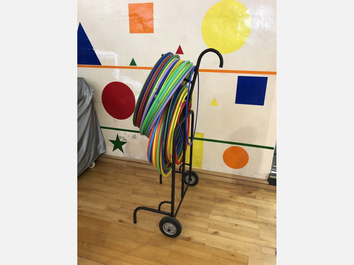 Custom wheeled trolley for storing sports hoops